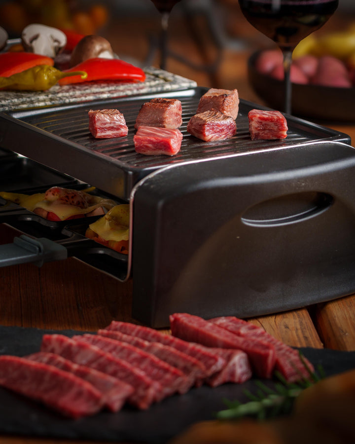 raclette-fondue-mix für besondere Anlässe, Wagyu-Fleisch-Tranchen und Beilagen